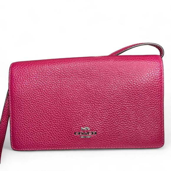 Coach Foldover Crossbody Clutch in the color Dark Fuchsia leather w/ charm NWT - Picture 7 of 13